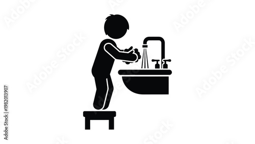 A child washing hands in sink.
