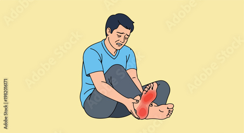 A distressed man sitting on the floor while holding his painful red foot area