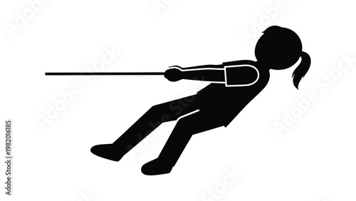 Silhouette of a girl ziplining outdoors.