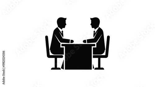 Two businessmen sitting at a table.