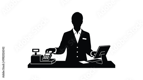 Businessman working at a desk with computer and telephone.