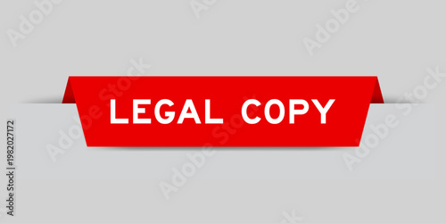 Red color inserted label with word legal copy on gray background