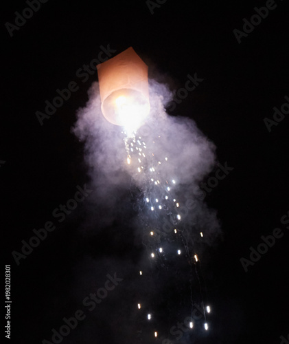 фотографія The Yi Peng lantern festival celebrated at Wat Buppharam in Chiang Mai, Thailand