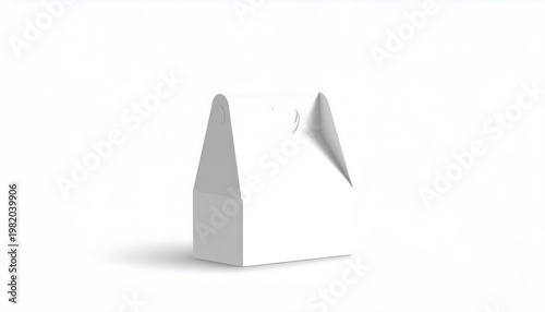 Simple white paper gable box stands on a white surface, casting shadow