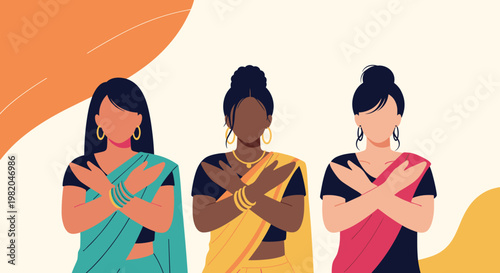 Three diverse Indian women wearing traditional saris in green yellow and pink crossing their arms as a sign of empowerment.