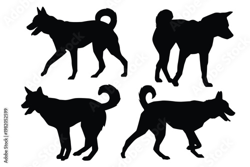 Four black dog silhouettes on white background