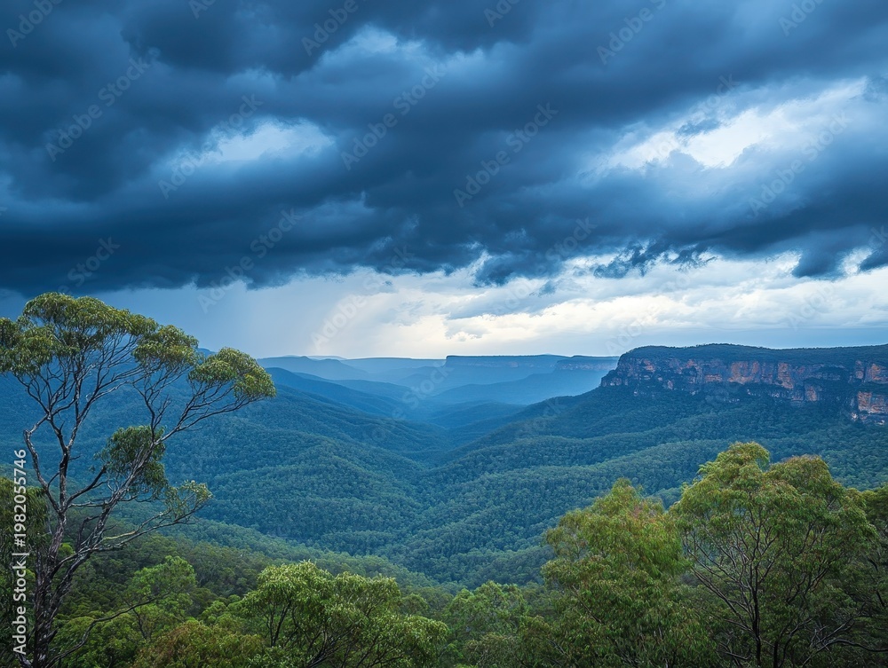 Obraz premium Lush Green Valley Under Dramatic Stormy Sky in Nature Landscape