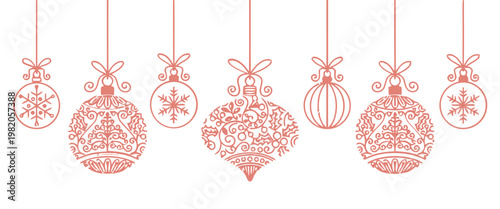 Red christmas ornaments hanging in a decorative row on a white background
