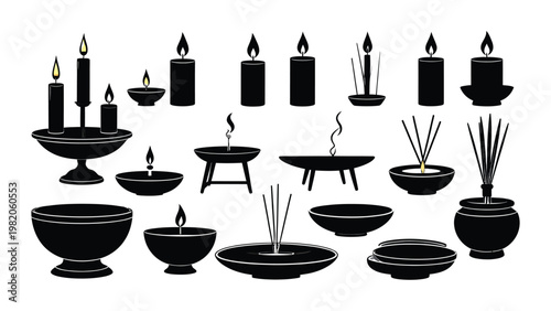 Collection of candle and incense stick holders.