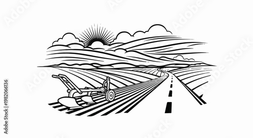 Sunrise over plowed fields with a road and farm equipment