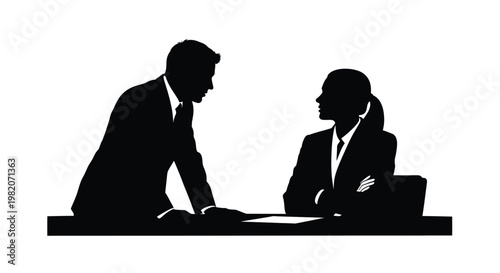 Business professionals engaged in conversation during a formal meeting