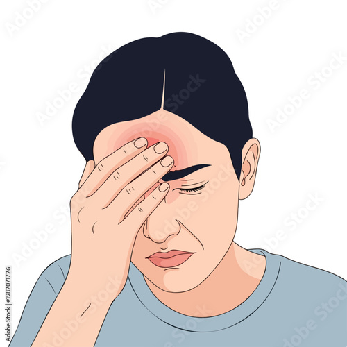 A person with dark hair holds their forehead in pain due to a severe headache