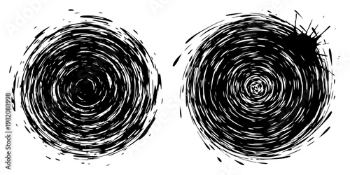 Circular spiral vortexes with rough edges and ink splatters in grunge style