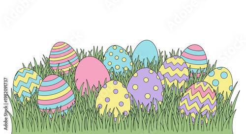 Colorful Easter eggs in grass.