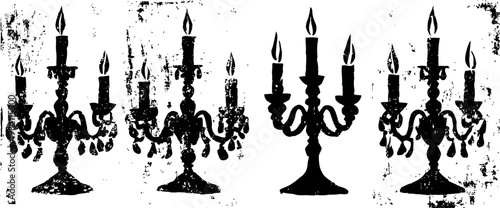 Vintage black candelabras silhouette set with lit candles and ornate design elements