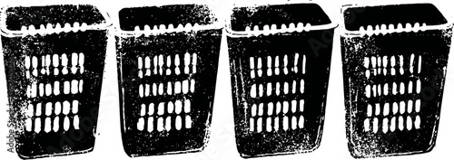 Four empty black plastic laundry baskets lined up in a row on white background