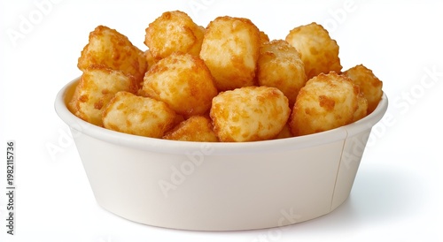 A white paper cup overflowing with golden brown tater tots isolated on a white background potato fried