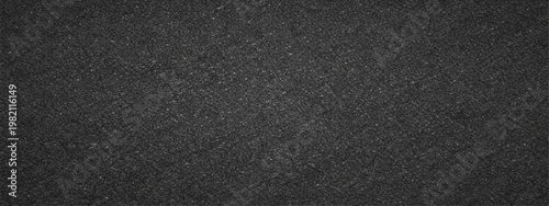 Abstract seamless dark texture with a grainy and speckled appearance, ideal for backgrounds or design elements.