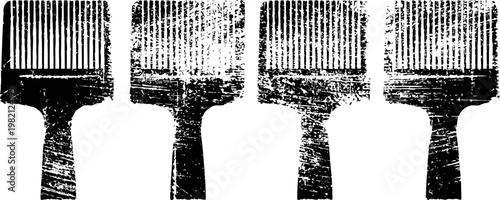 Vintage black paintbrush silhouettes with distressed textures isolated on white background
