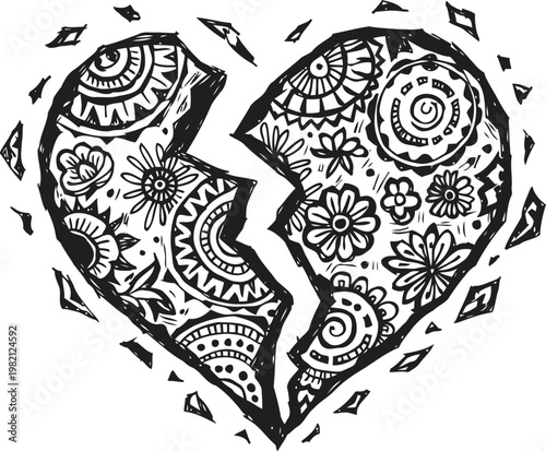 Broken heart with intricate floral and mandala patterns in black and white