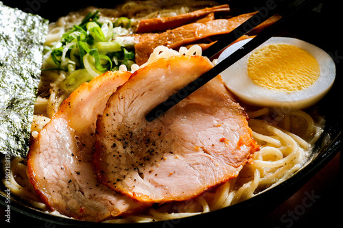 Ramen, Japanese cuisine, noodles, char siu pork, egg, broth, Asian cuisine, delicious, hot food, a meal, dinner, lunch, comfort food, tasty, traditional, gourmet, food photography, close-up, chopstick
