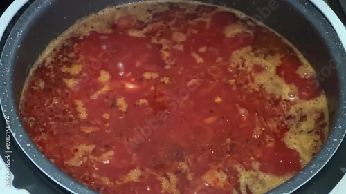 Boiling of red beetroot borscht in multi-cooker pot