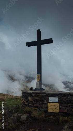 cross on mount todum summit in piedmont, italy