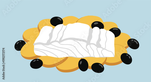A block of white feta cheese served on crispy round crackers with black olives