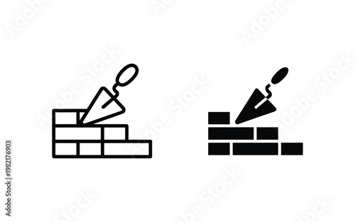 Building brick wall with trowel construction tool construction industry and labor concept icon design for building construction industry and labor.