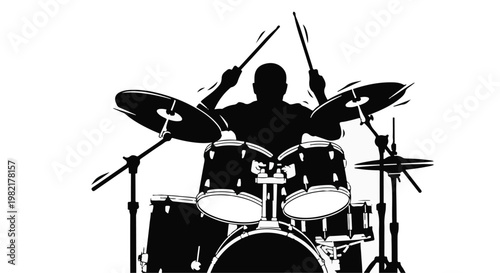 Drummer plays a rhythmic beat on a drum set while performing music on a stage for a live audience.