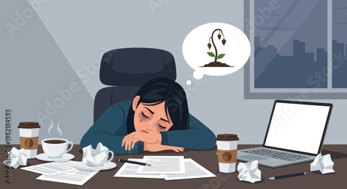 Businesswoman sitting at office desk with laptop and papers looking stressed