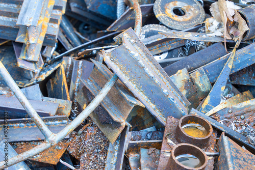 Rusty scrap metal pile with industrial steel waste