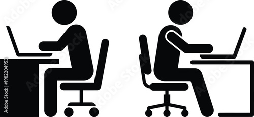 Two people sitting at desks working on laptops side by side in office chairs
