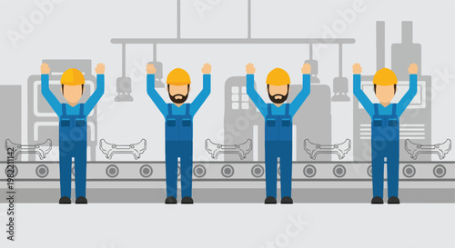 Four factory workers in blue overalls and hard hats cheering on production line