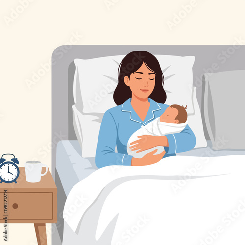 A mother wearing blue pajamas sits in bed holding her swaddled sleeping newborn