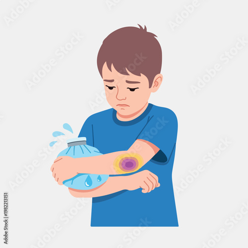 A sad boy in a blue shirt is applying an ice pack to a painful bruise on his arm