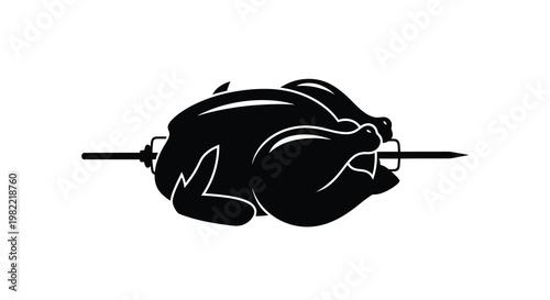 Black silhouette of a whole roasted chicken on a rotisserie spit