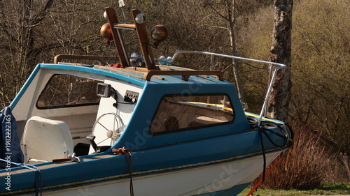 Blue motorboat on a trailer