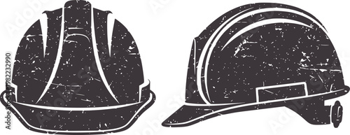 Two dark grey hard hats shown from front and side views with distressed texture helmet