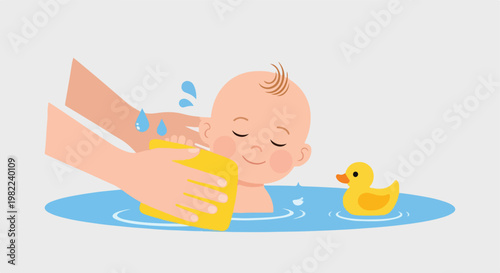 Cute infant taking a bath with adult hands using a yellow sponge and rubber duck