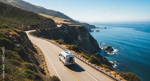 Camper Van Driving Along Scenic Coastal Highway Road Trip