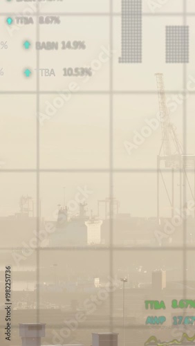 Vertical video: Data stream showing grid, blue rings, rates overlaying ship and crane for port ops