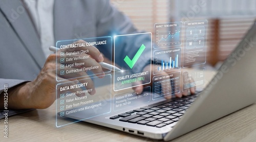 A business professional ensuring quality assurance and data integrity on a laptop