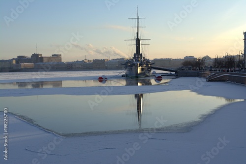 The cruiser Aurora on the frozen Neva River in St. Petersburg