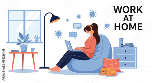 Woman working at home on a blue beanbag with a laptop while wearing a mask during the global coronavirus pandemic.