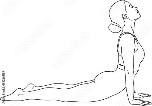 A graceful woman practicing the challenging cobra yoga pose, also known as Bhujangasana, to enhance flexibility and strength, promoting overall well-being.