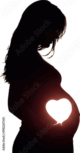 Pregnant woman holding her belly which features a glowing fetus inside a shining heart shape as she stands beautifully against a warm bright golden sunset