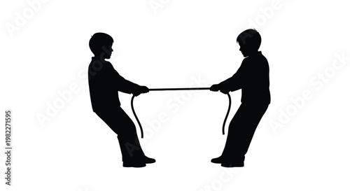 Two boys engaged in a tug of war competition stark silhouette