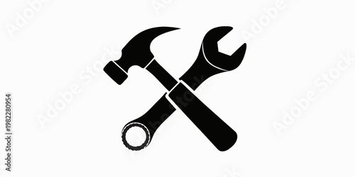 Black silhouette of crossed hammer and wrench construction tool icon with construction maintenance carpentry plumbing hardware equipment handyman industry mechanical craftsman building