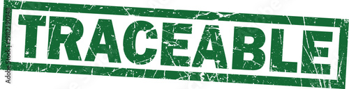 Green distressed rubber stamp impression with the word traceable in bold sans-serif font